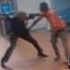 Surveillance video that appears to show an off-duty police officer working as a security guard at an Atlanta Wal-Mart beating Tyrone Carnegay with a baton
WSB-TV Screenshot